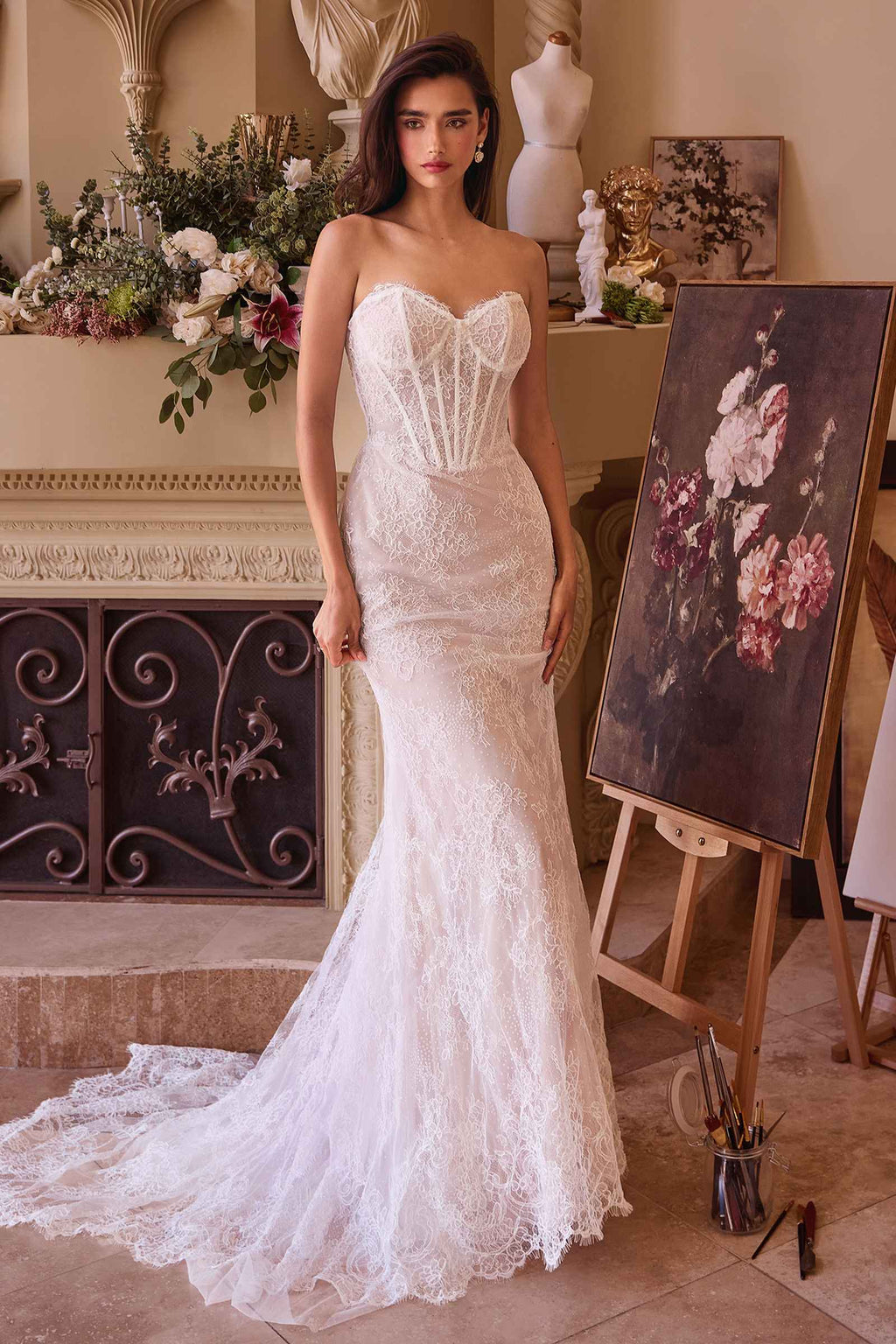 Off-white lace fitted wedding dress with corset bodice and removable overskirt