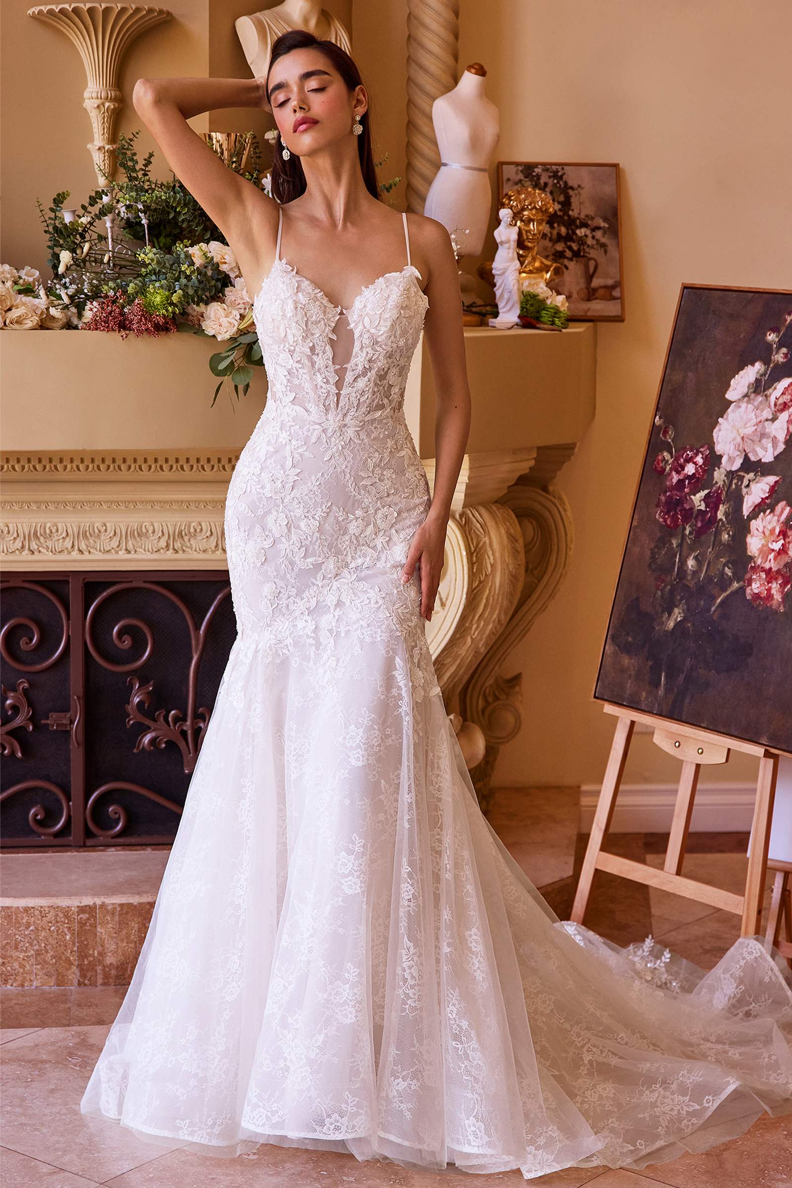 Off-white fitted lace wedding mermaid gown with spaghetti straps and scalloped lace finish