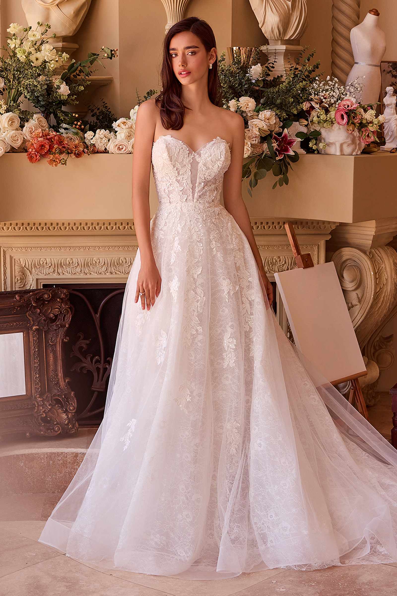 Off-white strapless sweetheart ball gown with lace bodice and full tulle skirt