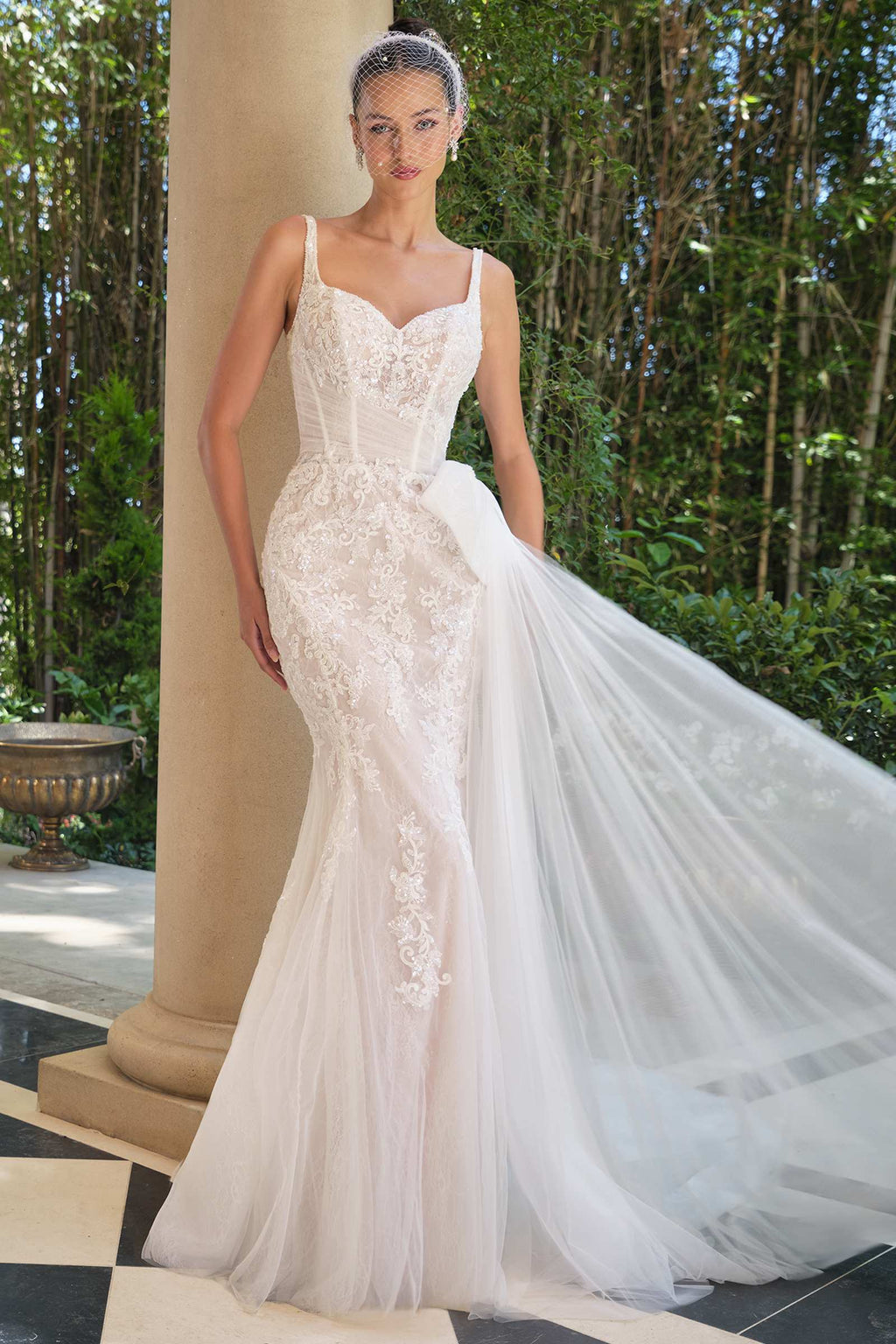 Off-white embroidered lace mermaid dress with sweetheart neckline and flowing tulle skirt