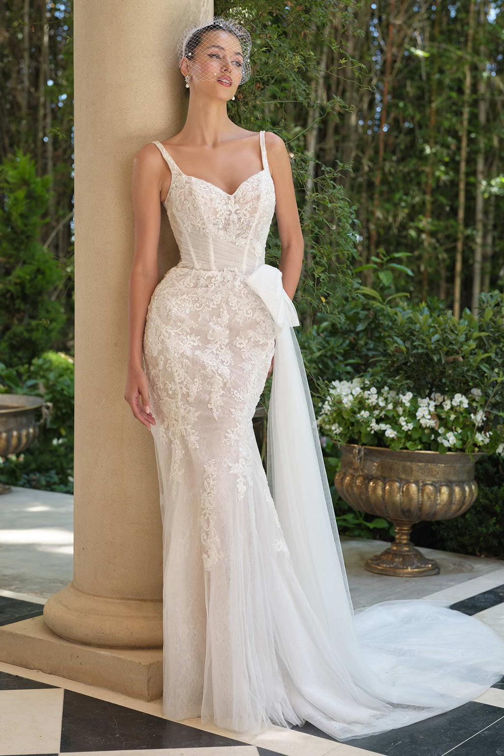 Off-white lace mermaid dress with sweetheart neckline, fitted waist, sheer open back