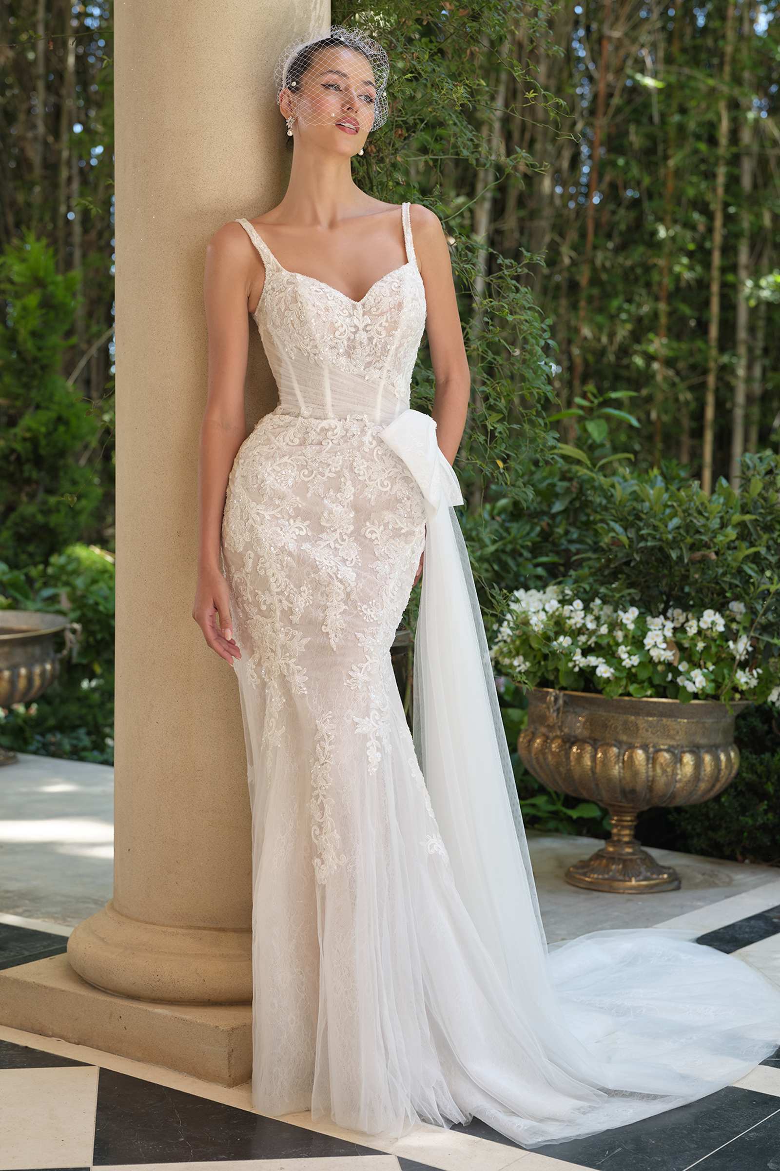 Off-white lace mermaid dress with sweetheart neckline, fitted waist, sheer open back