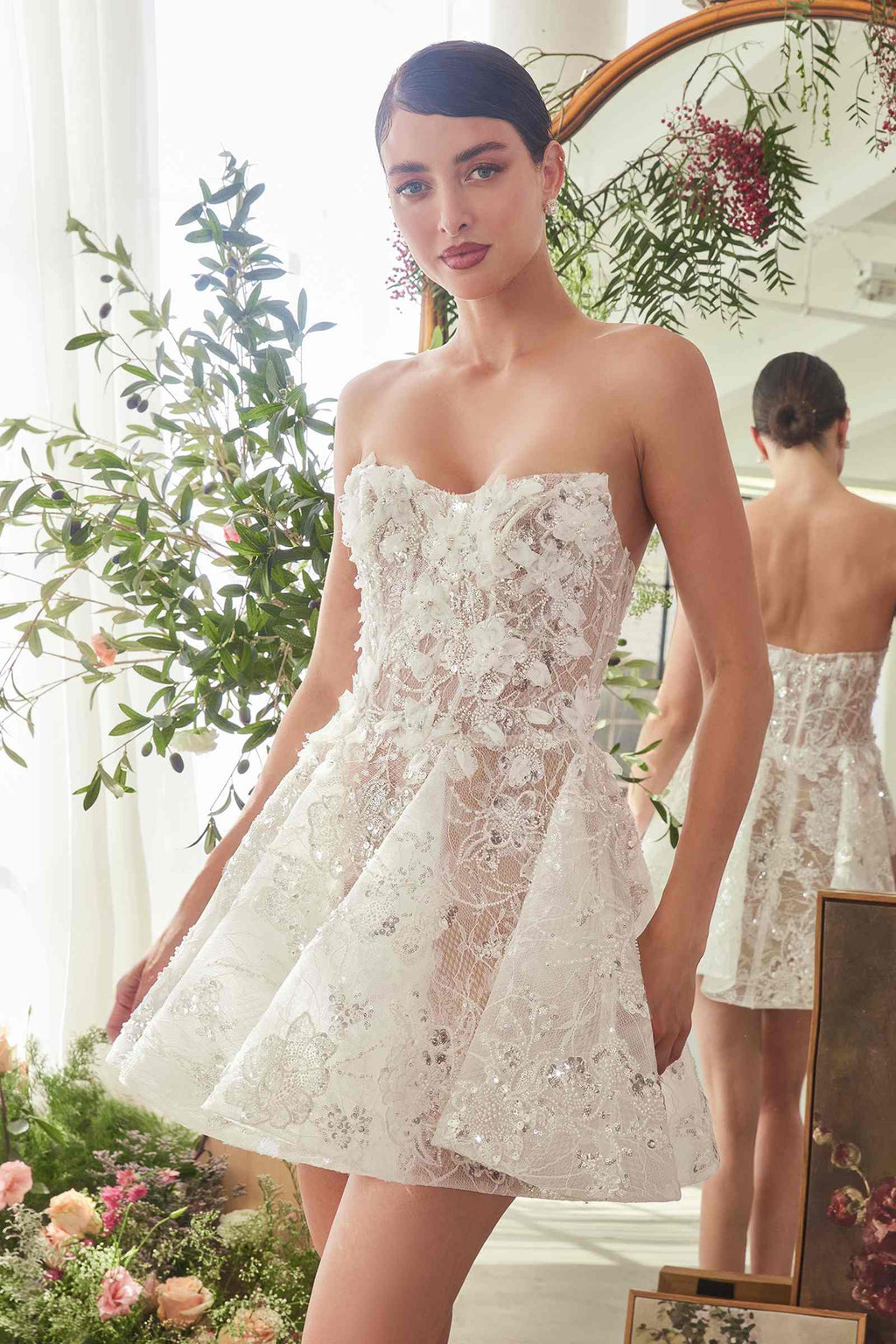 Off-white strapless mini A-line dress with floral applique and pleated skirt