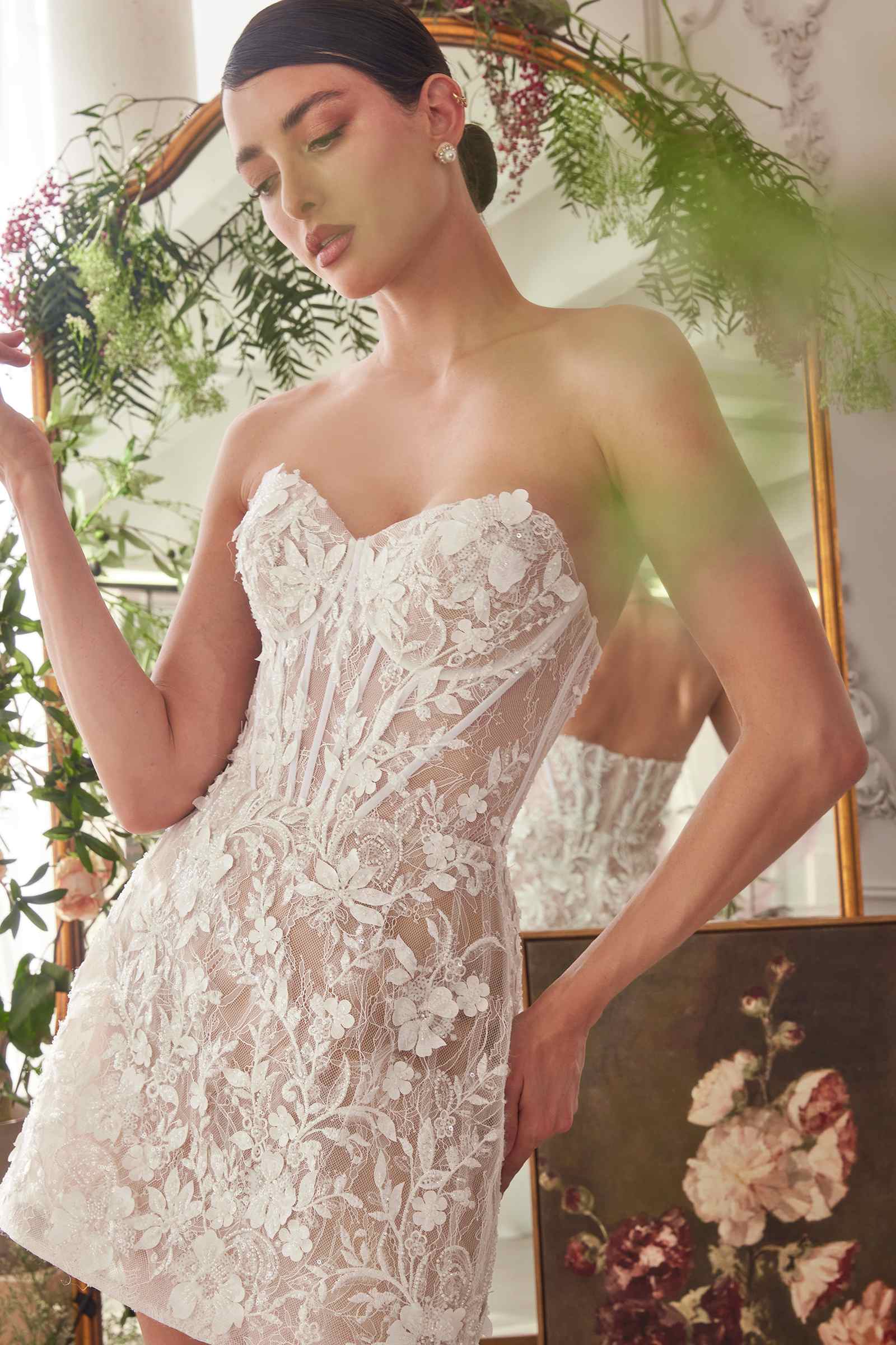 Off-white strapless lace wedding dress with sweetheart neckline and fitted corset bodice