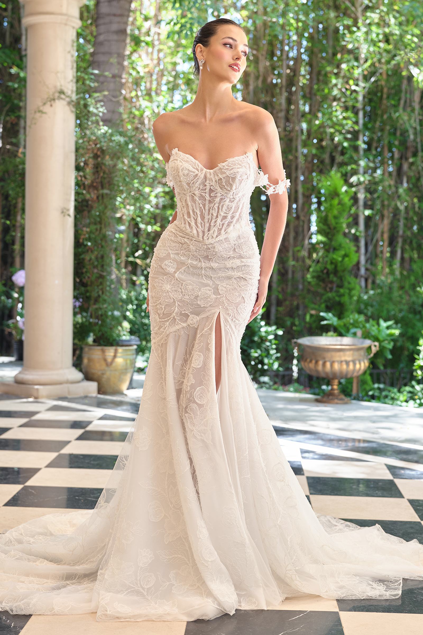 Off-shoulder off-white lace fitted wedding gown with sweetheart neckline and flowing train