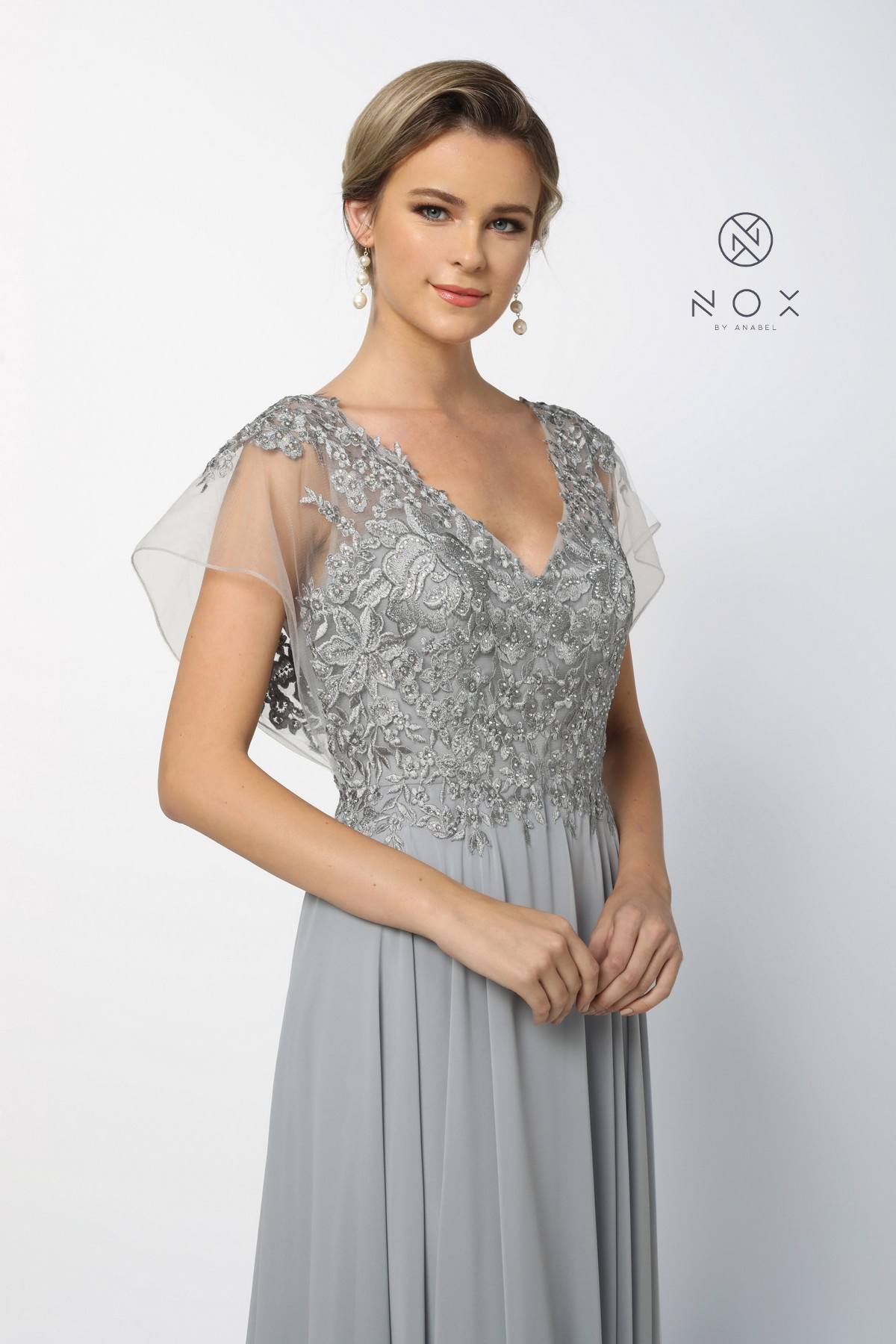 Long evening dress, silver lace V-neck bodice with sheer cap sleeves and gray pleated skirt