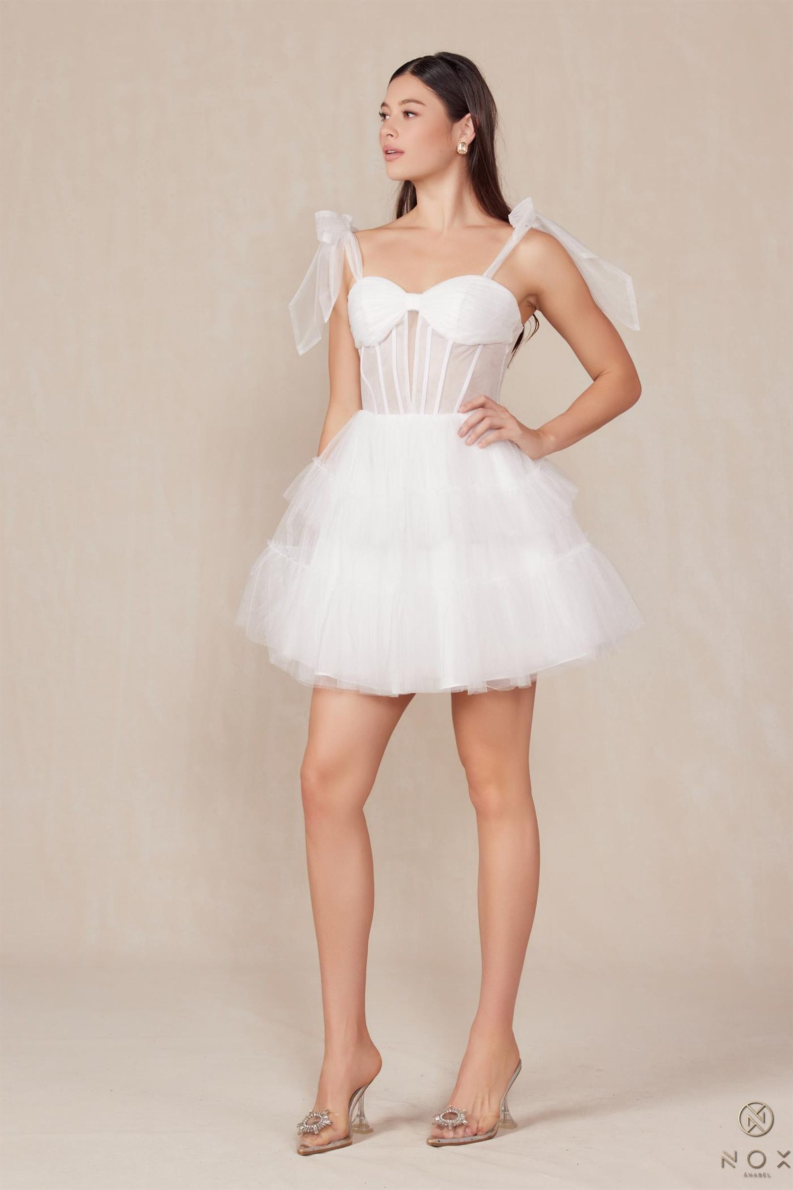 White short A-line tulle dress, sweetheart bodice, bow straps, layered tiered ruffle skirt