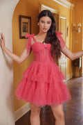 Fuchsia A-line tulle mini dress with ruffled tiers and bow straps, corset bodice