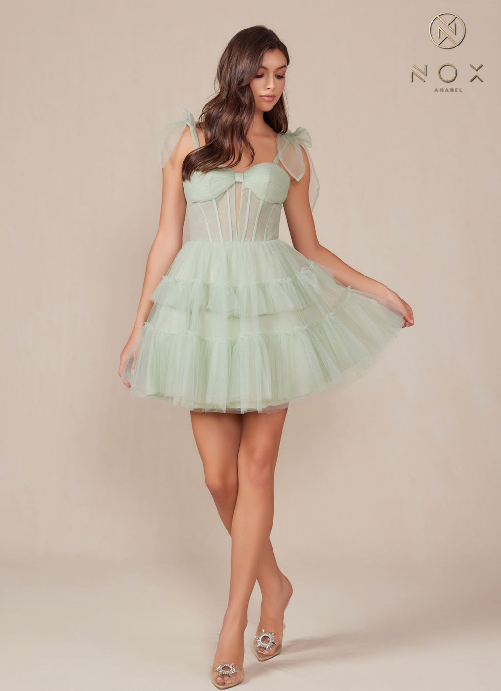 Sage green A-line tulle mini dress with tiered ruffle skirt and scoop neckline