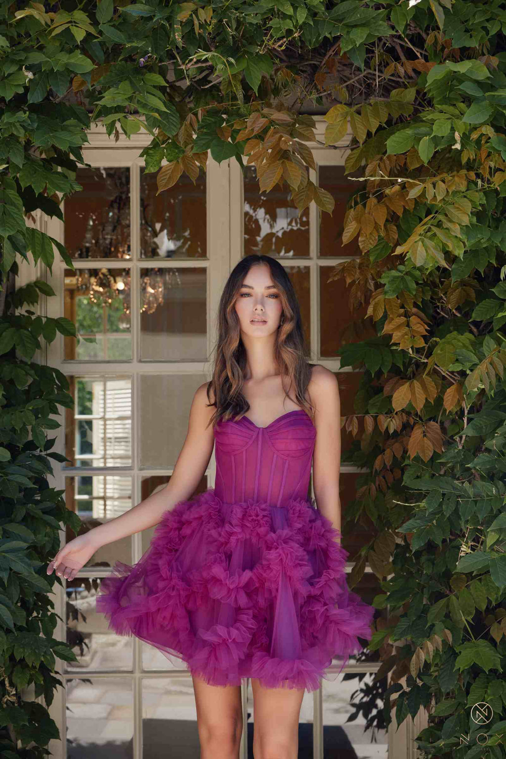 Strapless sweetheart A-line dress in dusty magenta with layered ruffle skirt