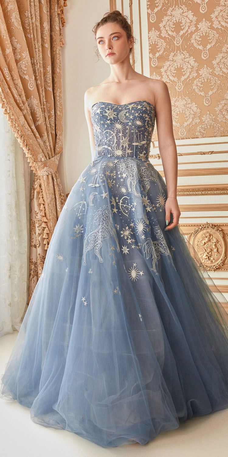Strapless long tulle dress in blue with glittery constellation star and animal motifs