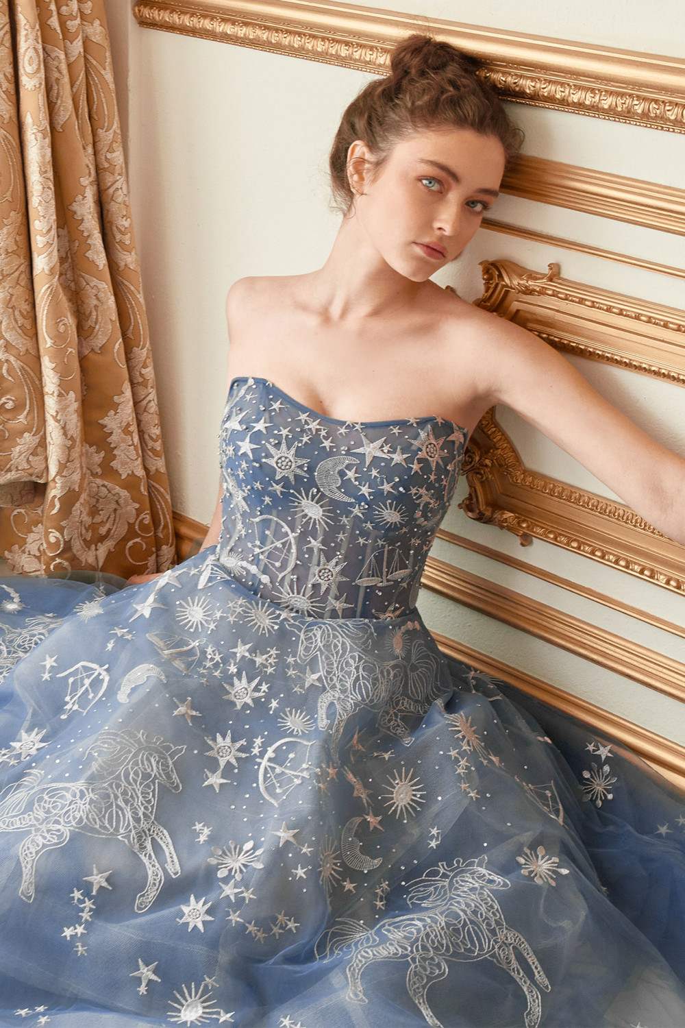 Blue strapless long tulle dress with glitter constellation print and full flared skirt