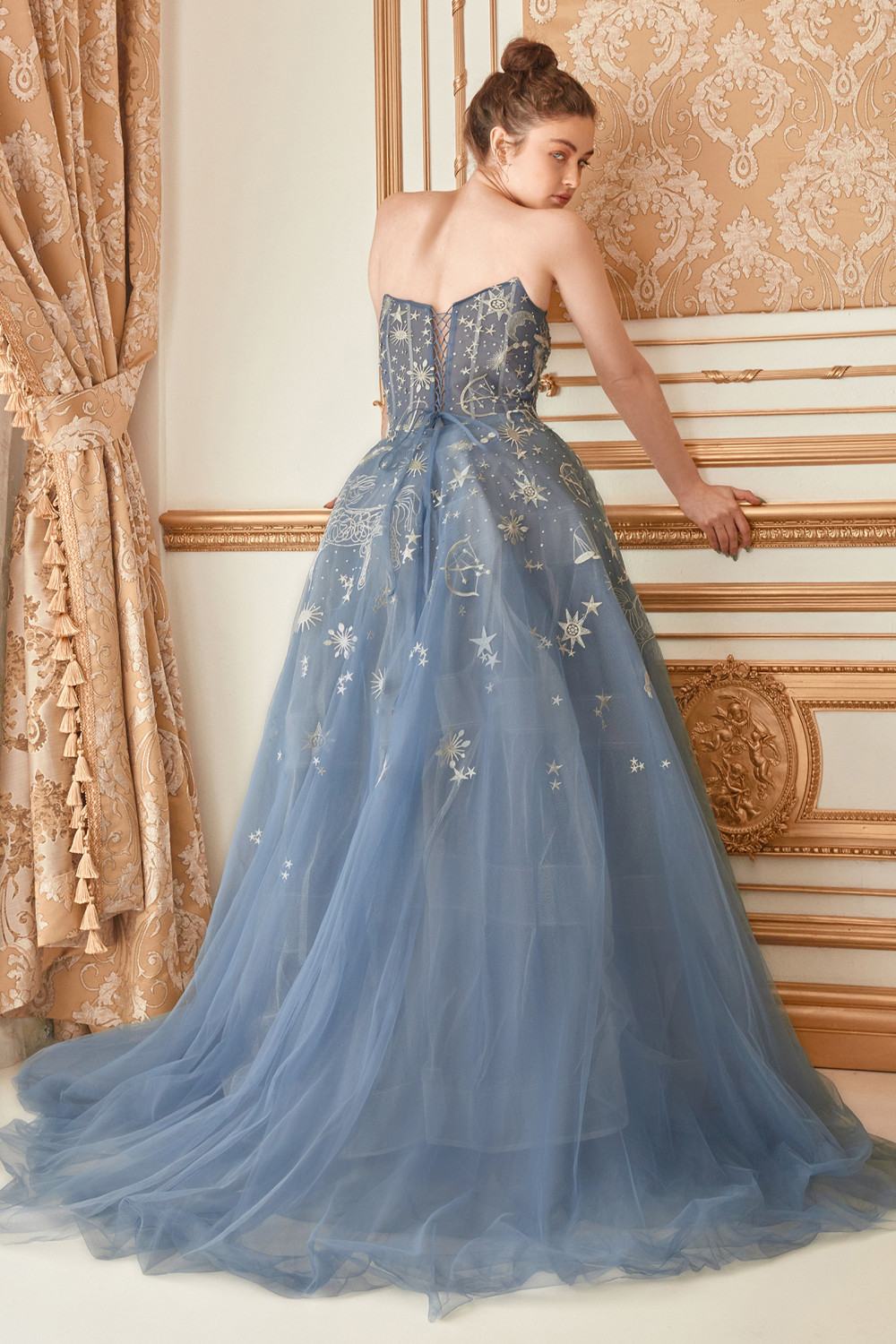 Blue strapless long tulle dress with fitted corset bodice and starry full skirt