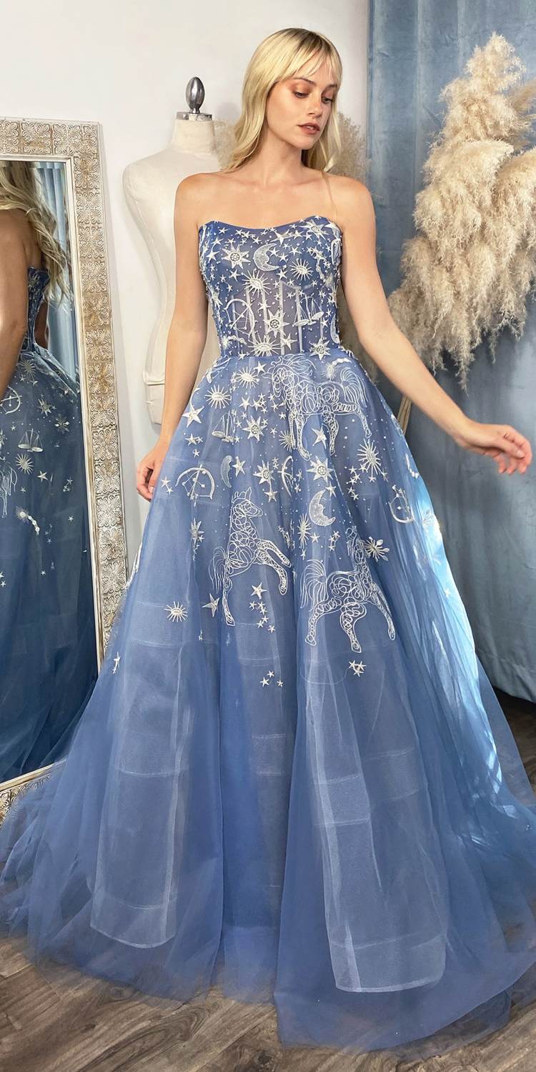 Blue strapless long tulle dress with allover constellation stars and animal silhouettes