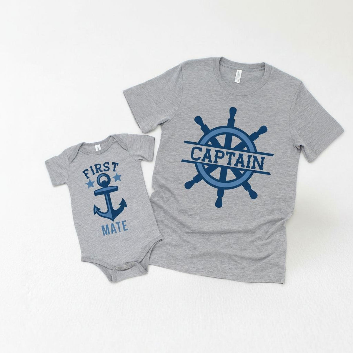 Gray Captain T-shirt and First Mate bodysuit with blue ship wheel and anchor