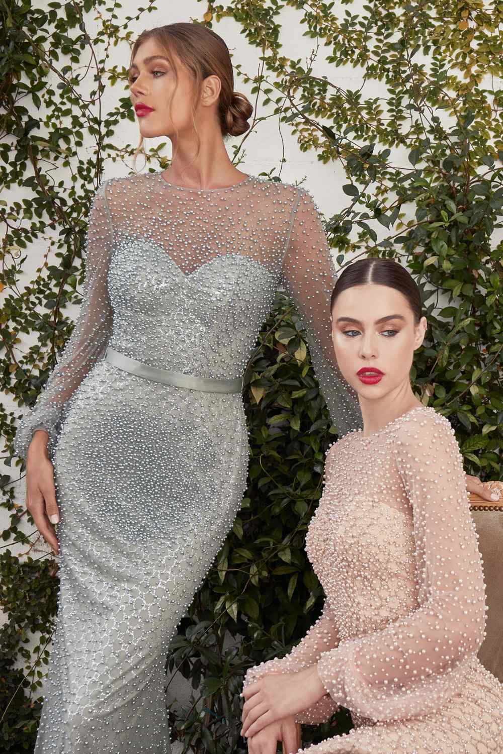 Dusty mint pearl-beaded long sleeve gown beside blush pearl-beaded gown