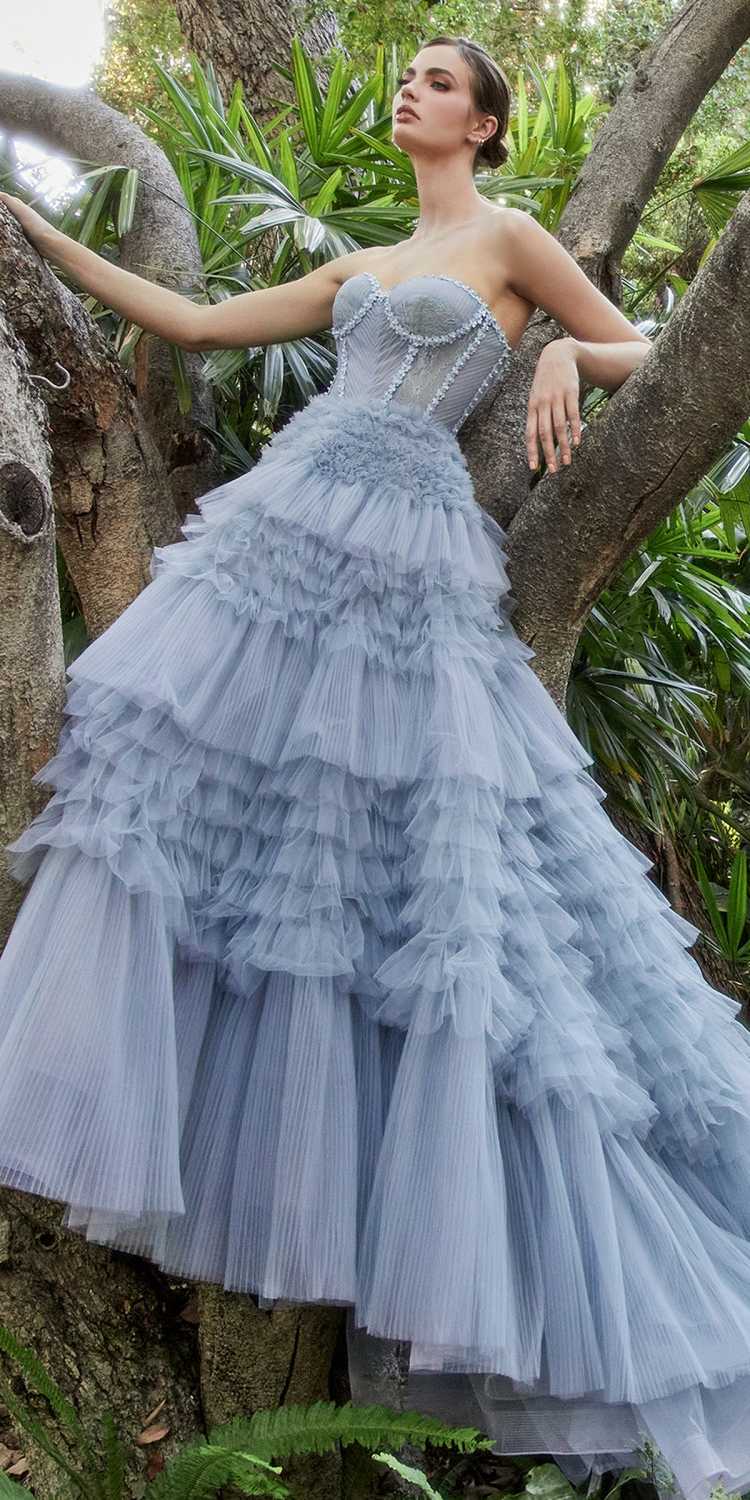Light blue corset ball gown with strapless sweetheart neckline and tiered ruffle tulle skirt