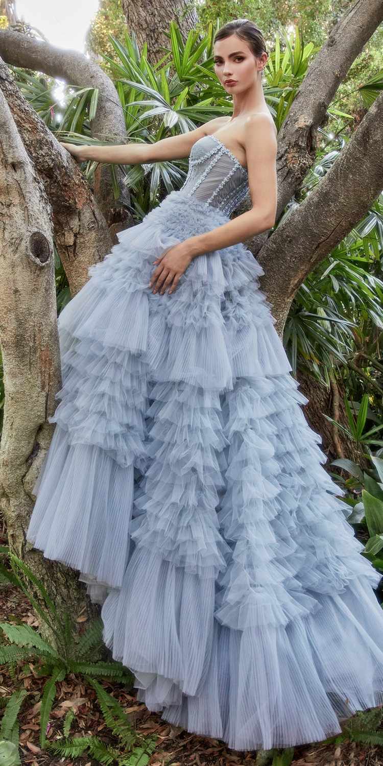 Light blue tulle princess ball gown with strapless corset bodice and cascading ruffle tiers
