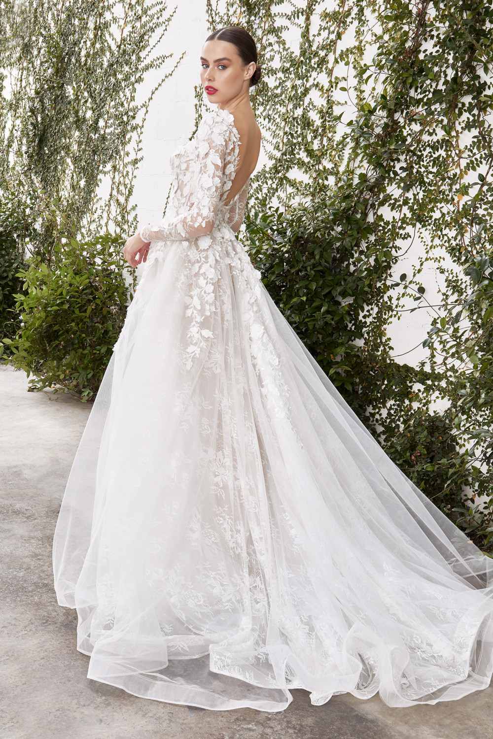 Off-white lace wedding gown with illusion back and voluminous A-line skirt