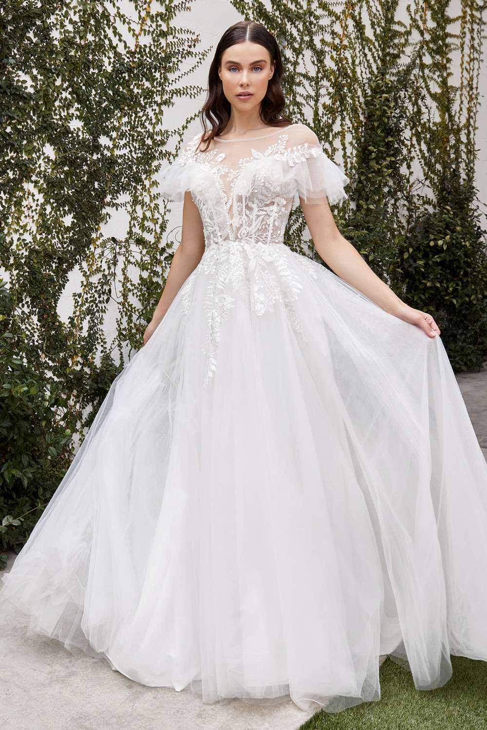 Off-white A-line wedding gown with lace square neckline and voluminous tulle skirt