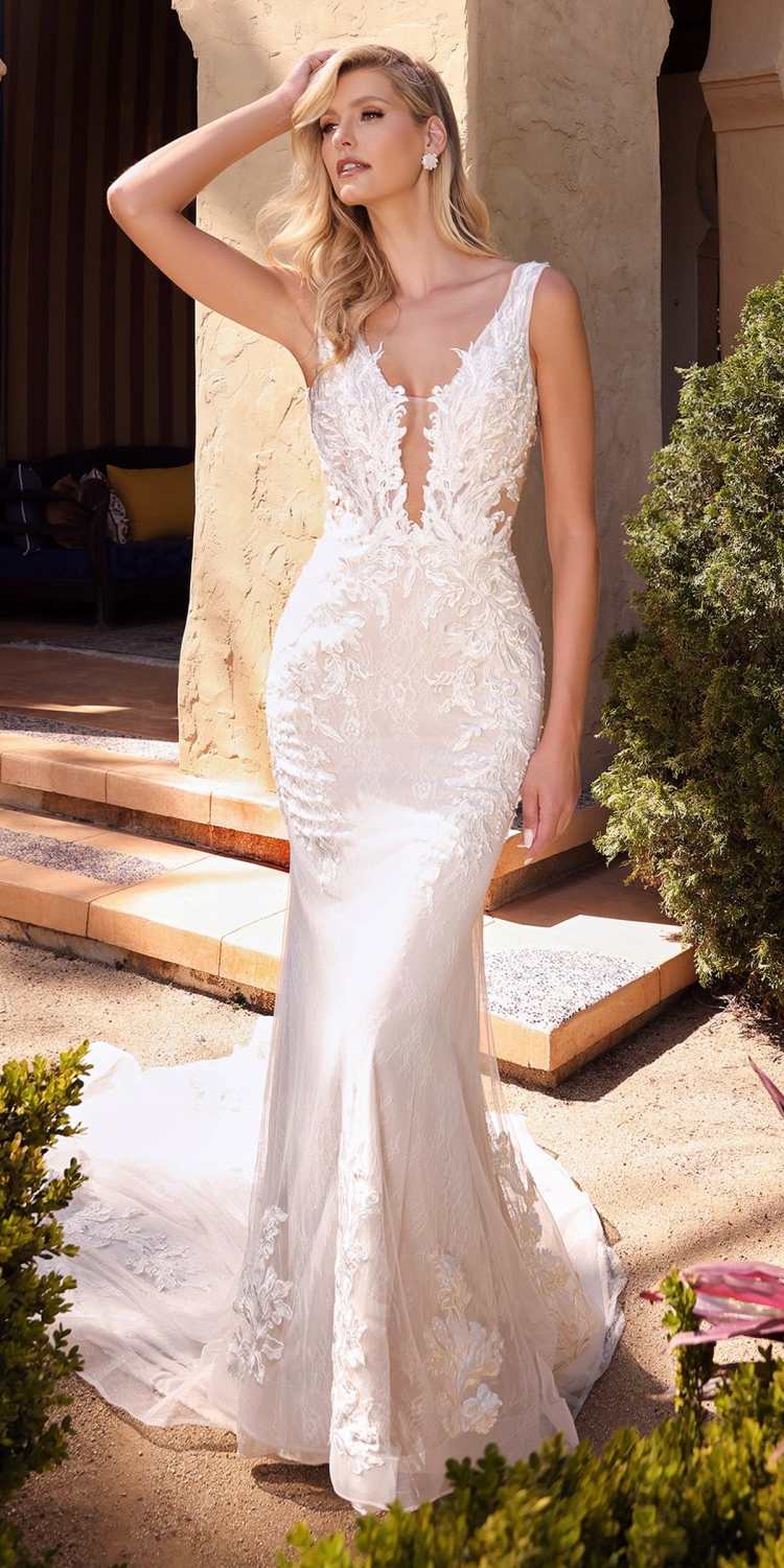 Off-white lace wedding gown with sleeveless V-neck and fitted mermaid silhouette