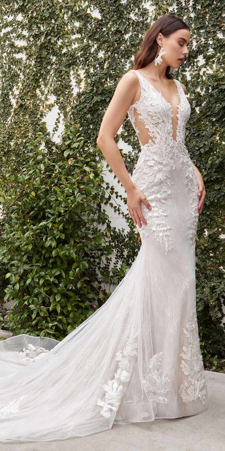 Off-white lace wedding gown with deep V-back and long train
