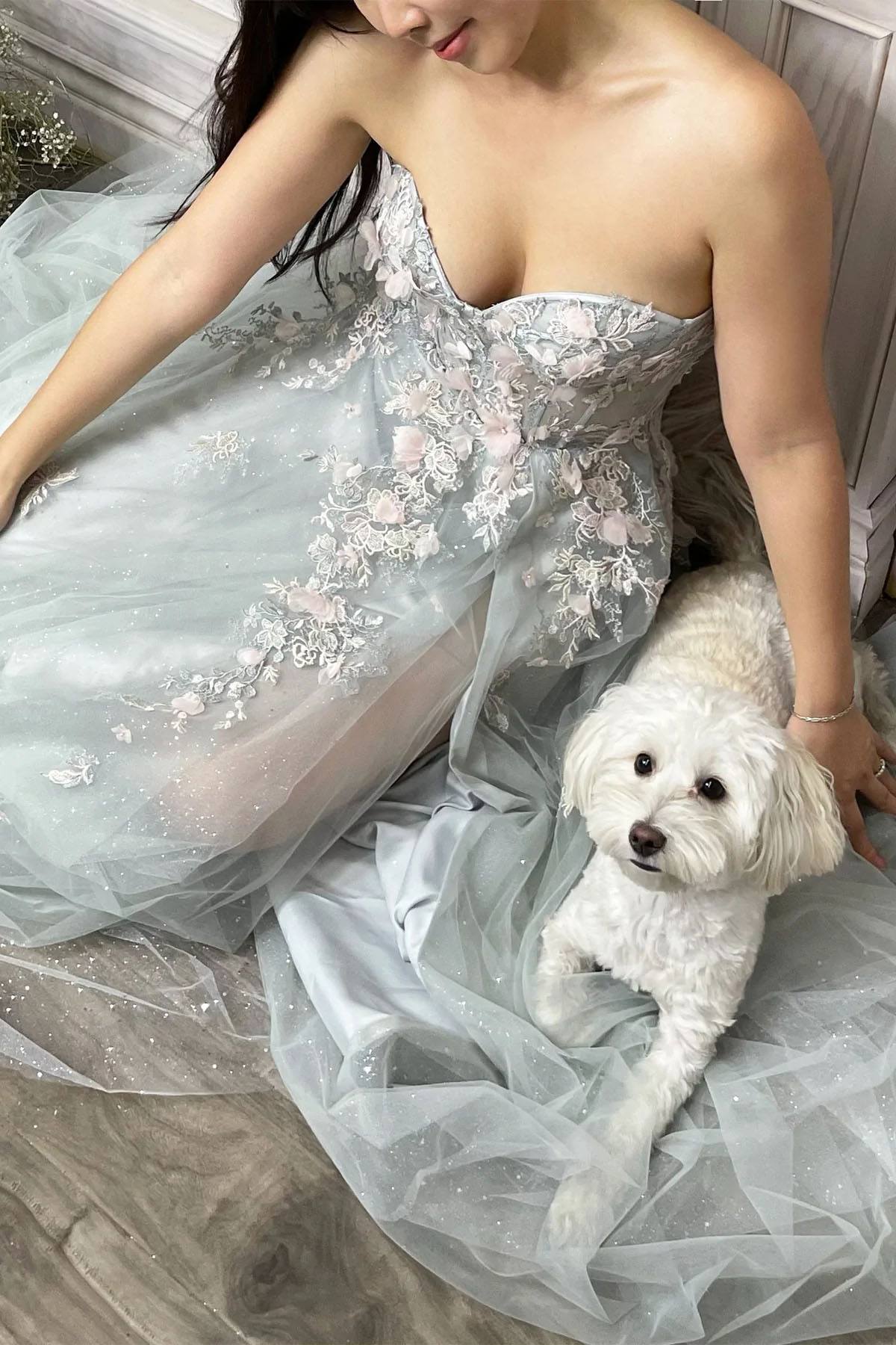 Light blue strapless embroidered bodice gown with flowing tulle skirt