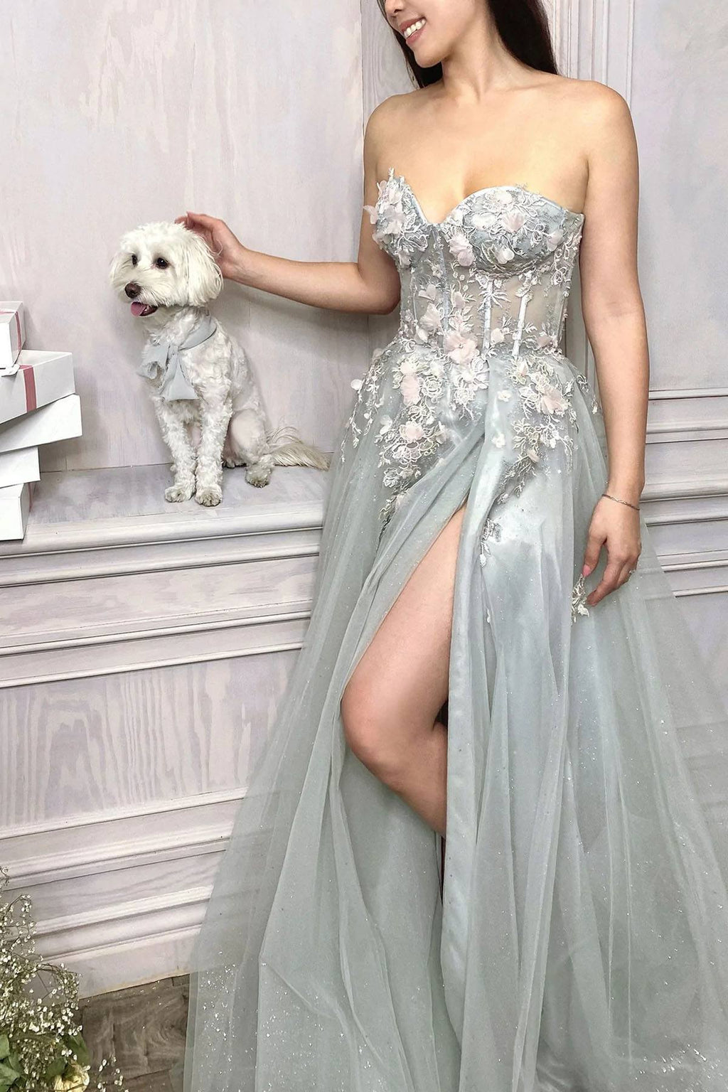 Strapless sage green embellished gown with sweetheart bodice and sheer overskirt train