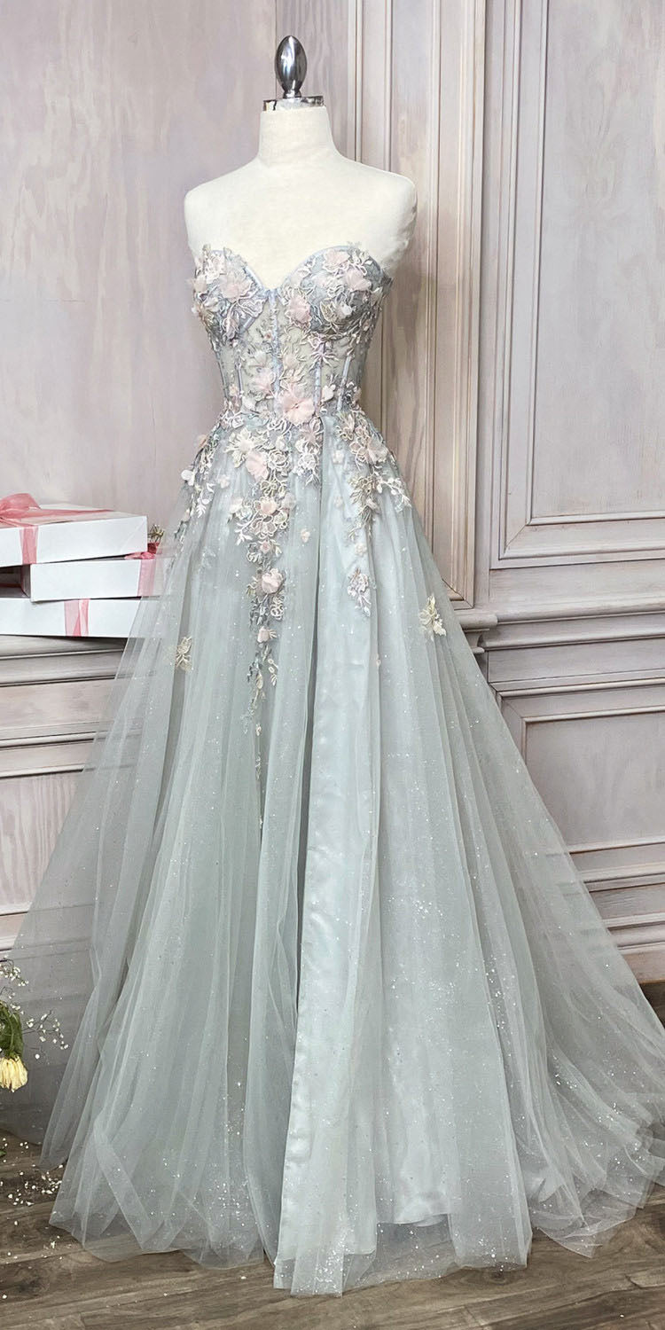 Sage green strapless embellished gown with sweetheart bodice and full tulle overskirt