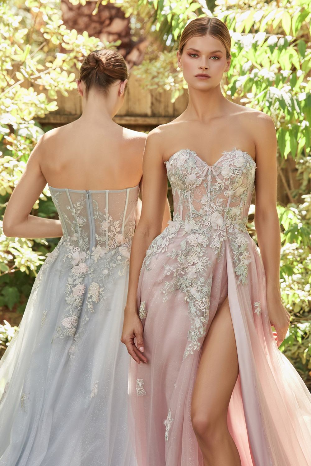 Strapless embellished gown with sweetheart neckline, floral applique, and high slit
