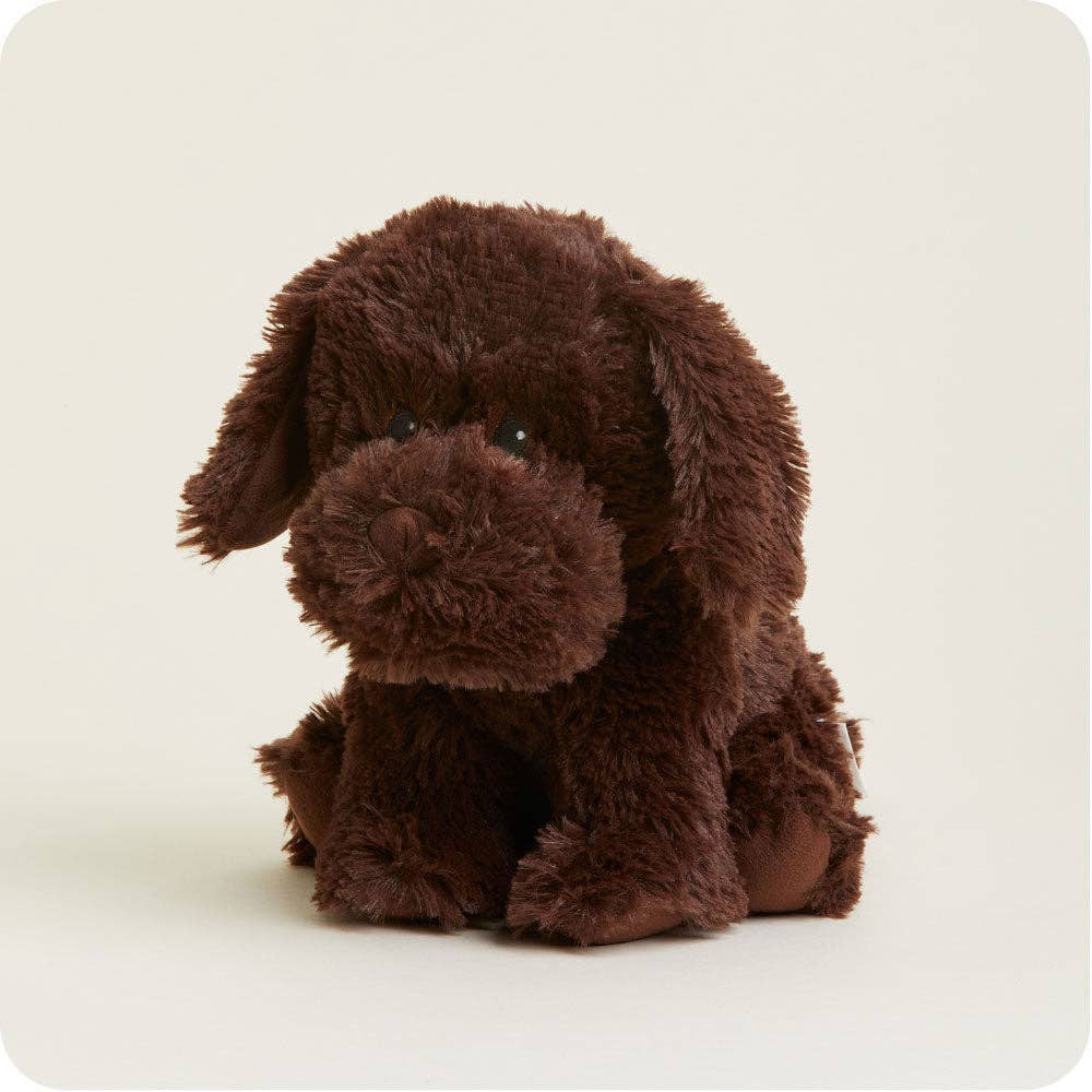 Chocolate brown plush labrador dog sitting in a side pose