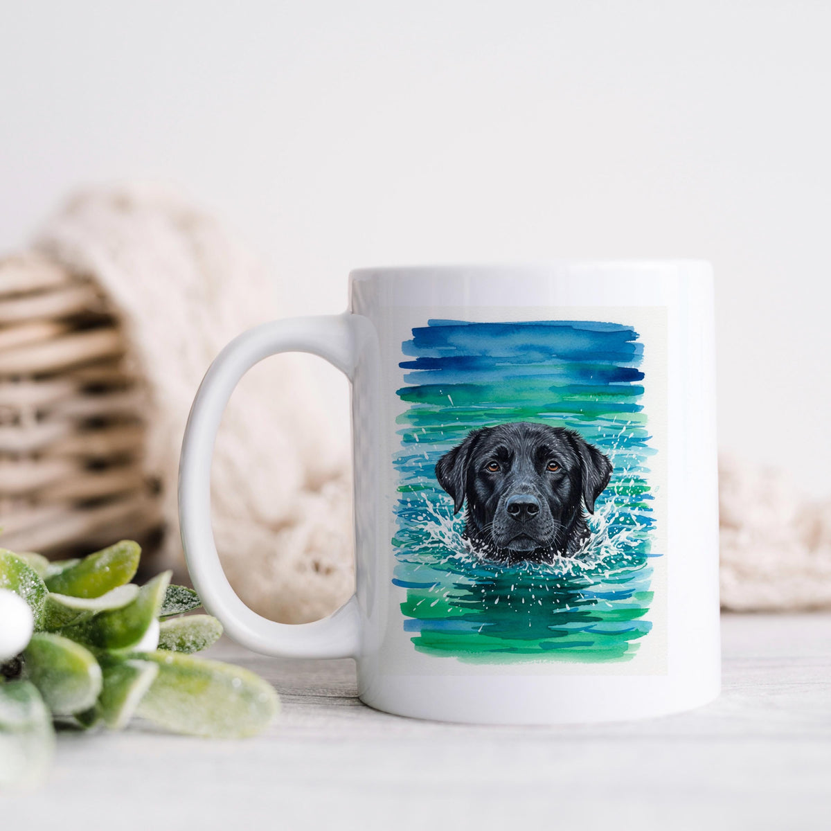 White ceramic coffee mug with watercolor black lab portrait, blue-green splash design