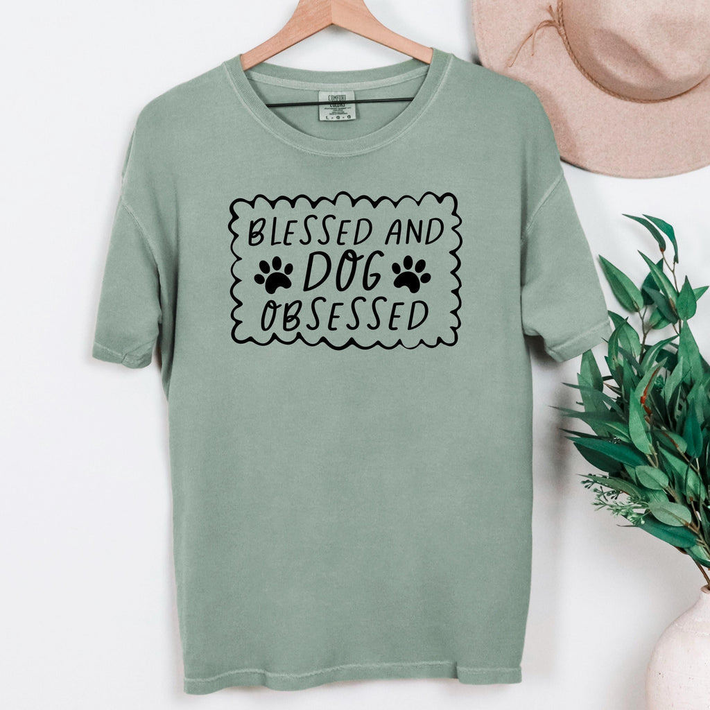 Moss green short-sleeve T-shirt with “Blessed and Dog Obsessed” paw print graphic