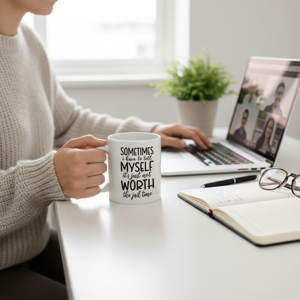 White ceramic coffee mug with “SOMETIMES…MYSELF…WORTH” quote, held near a laptop