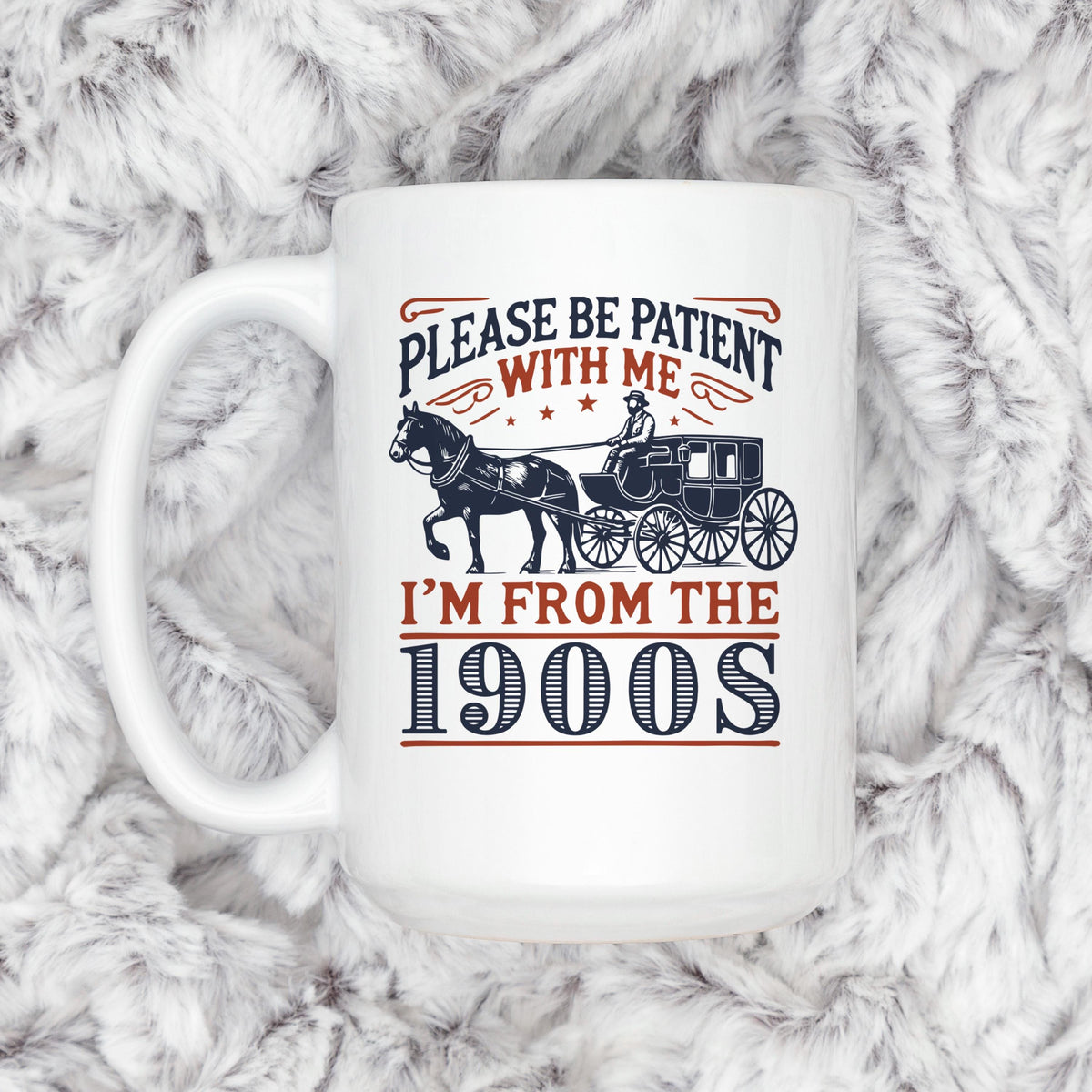 White ceramic mug with horse carriage graphic and “Please be patient with me” text.