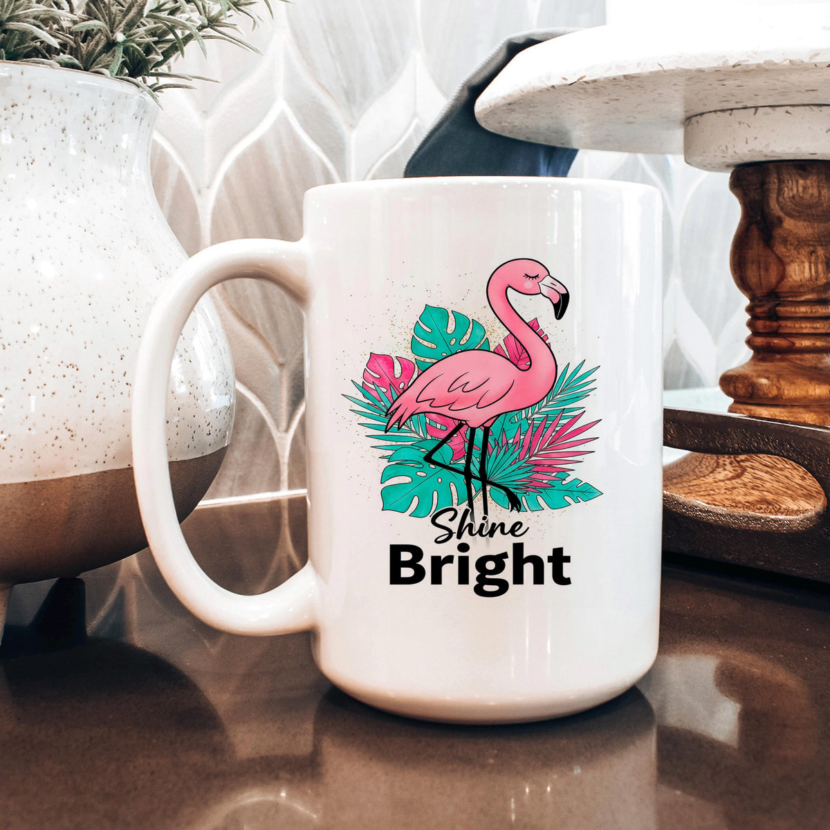White coffee mug with pink flamingo and colorful tropical foliage, “Shine Bright”