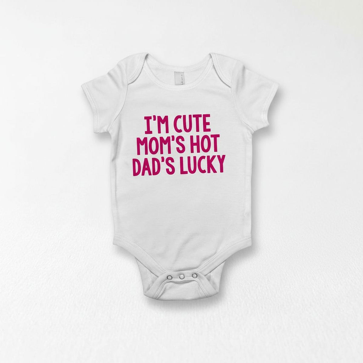 White newborn short-sleeve one-piece with pink slogan text on the chest