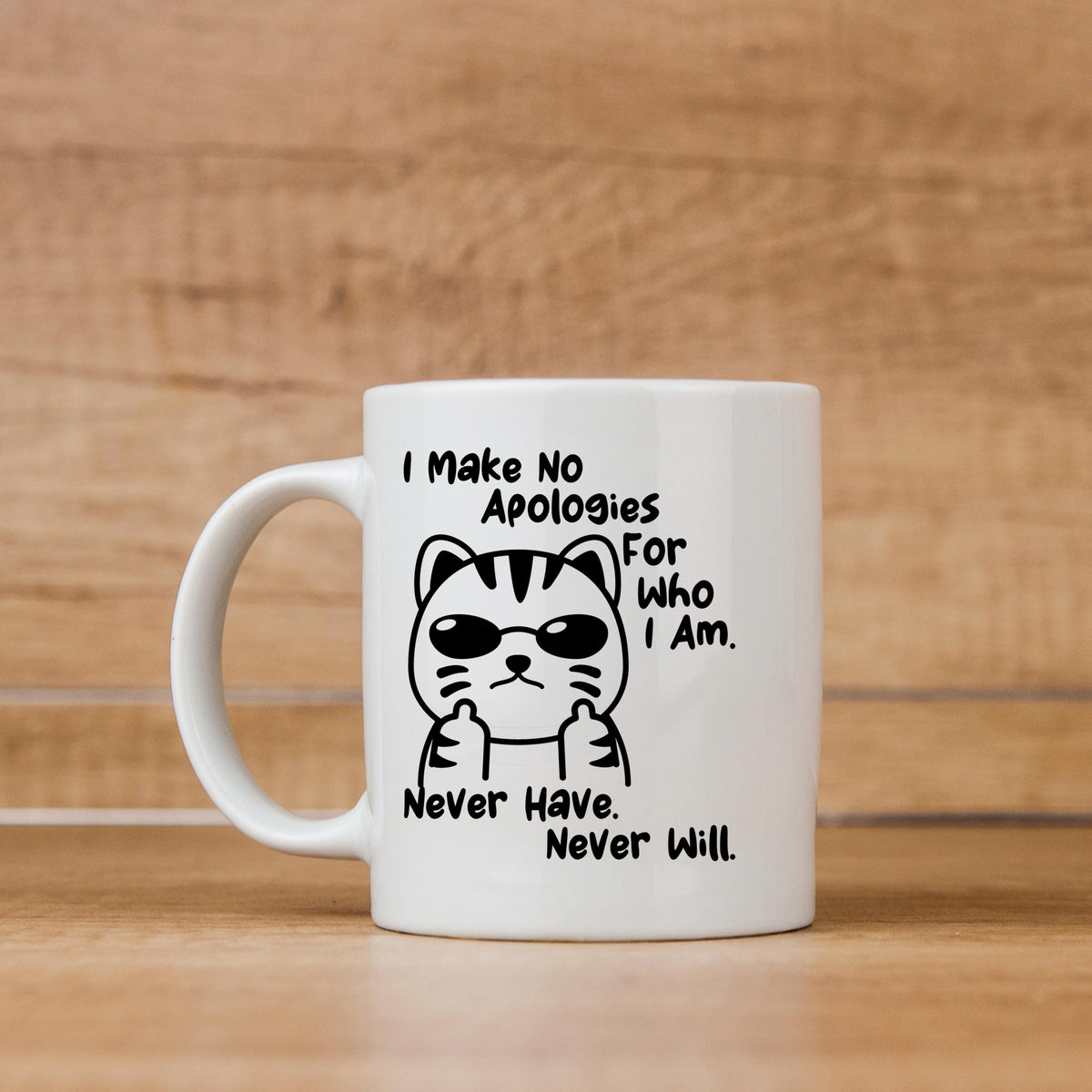 White ceramic coffee mug with black cat graphic and quote text “Never Have. Never Will.”