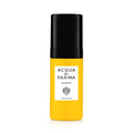 Acqua di Parma Barbiere beard serum bottle, black cap and amber-gold liquid