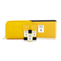 Acqua di Parma shaving kit with yellow zip pouch and three grooming tubes