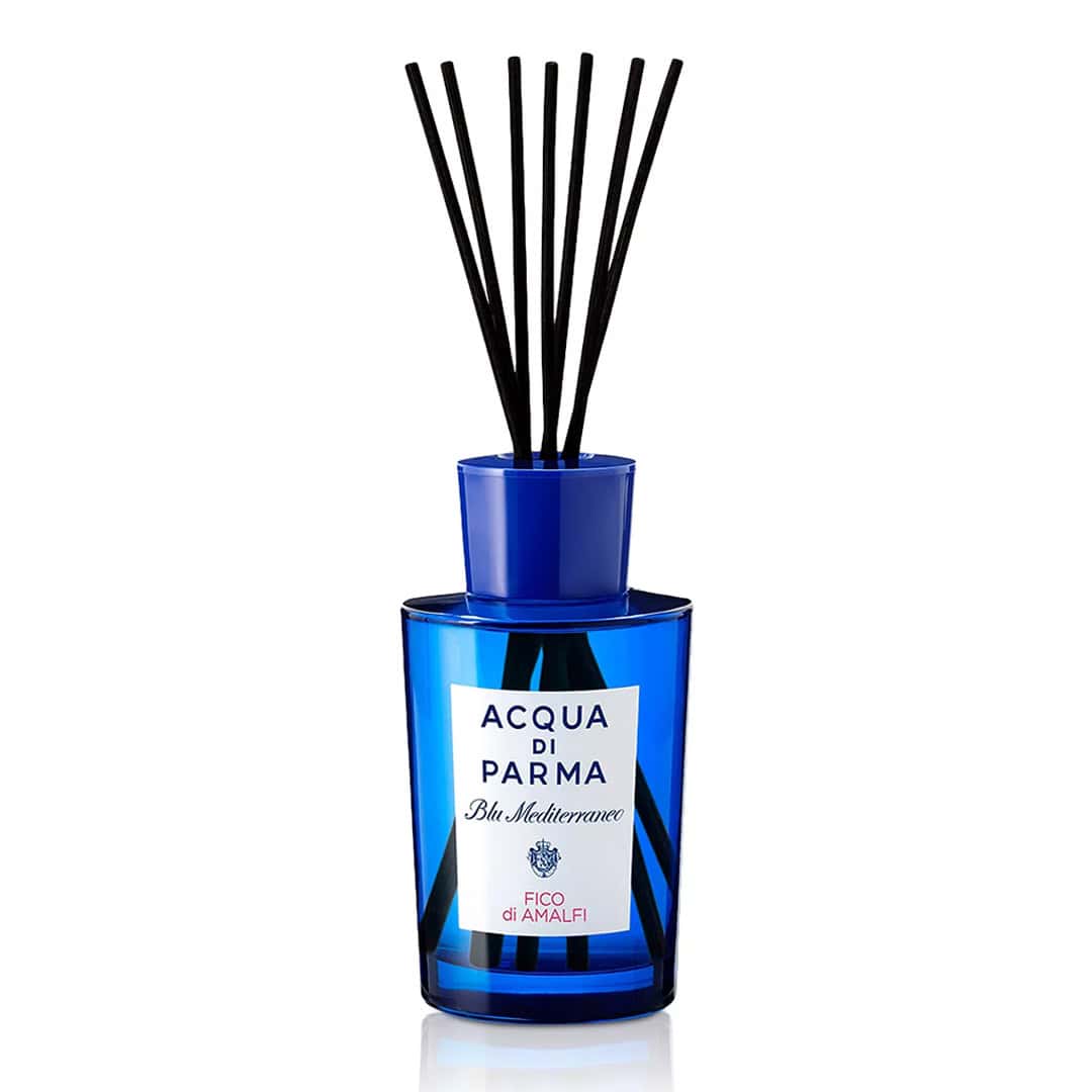 Acqua di Parma room diffuser with blue glass bottle and reed sticks