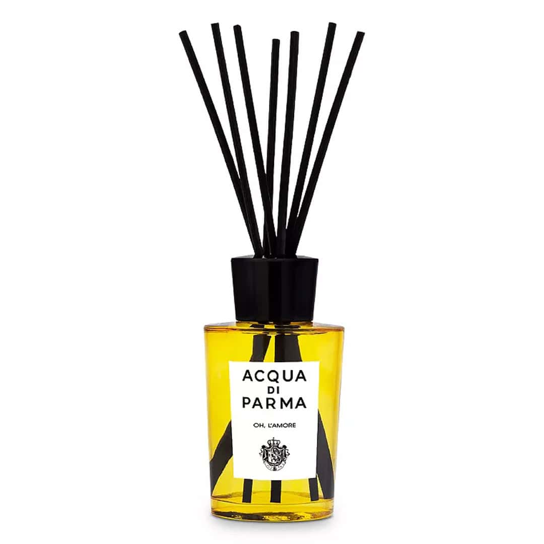 Room diffuser bottle with black reed sticks; amber glass, Acqua di Parma label