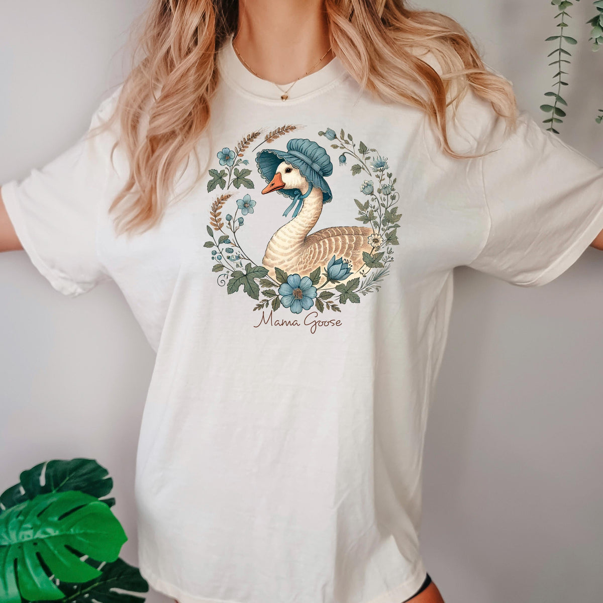 White T-shirt with blue bonnet goose floral wreath graphic