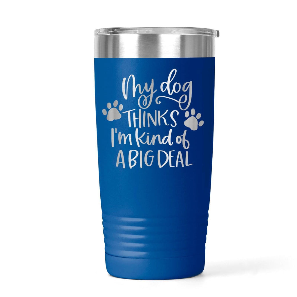 Blue stainless steel travel tumbler with dog paw quote: “My dog thinks I’m kind of a big deal”.