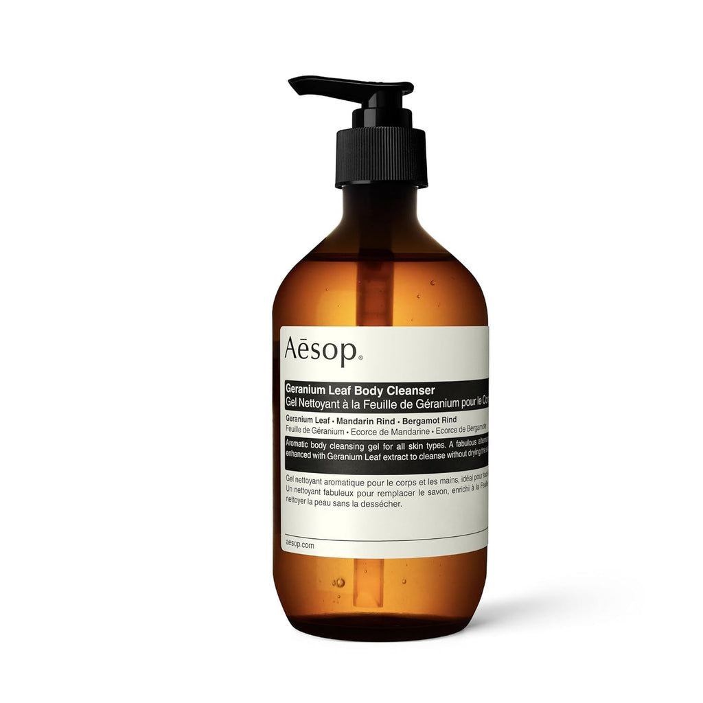 Aesop body cleanser bottle with pump, amber bottle and white label