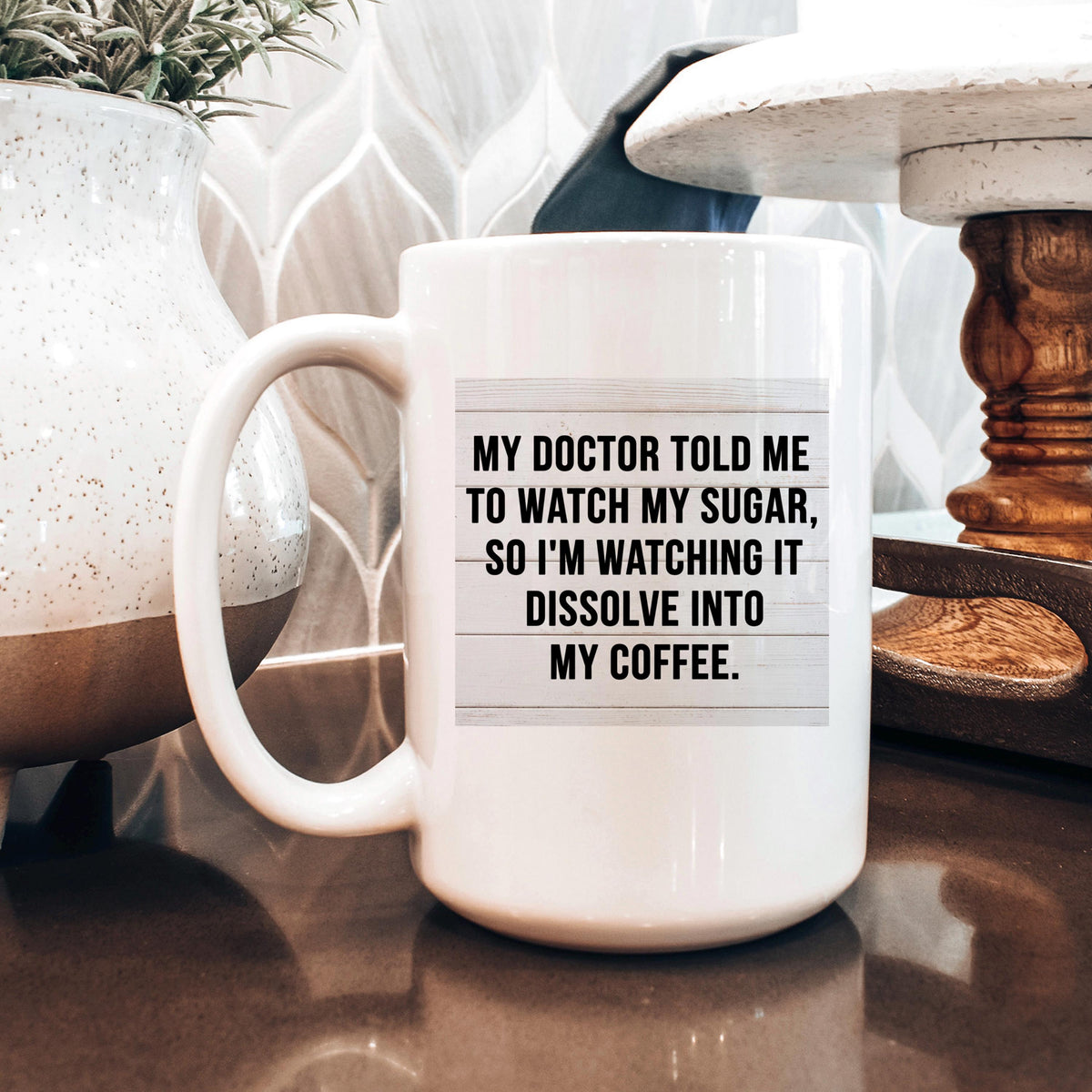 White coffee mug with bold quote “My doctor told me...” on the front