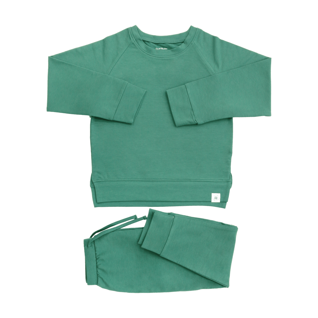 Green crew neck sweatshirt and jogger pants set, flat lay with elastic cuffs