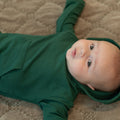Alpine green hooded jogger set on model: hoodie with matching jogger pants.