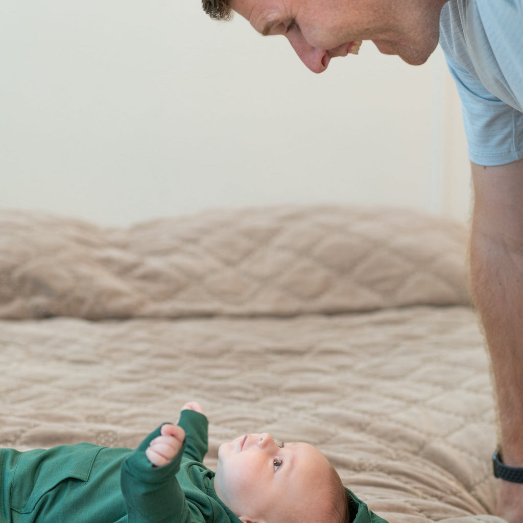 Alpine green hooded jogger set on child, long-sleeve hoodie and jogger pants.