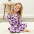 Kids long-sleeve pajama set in purple floral print, featuring matching top and pants